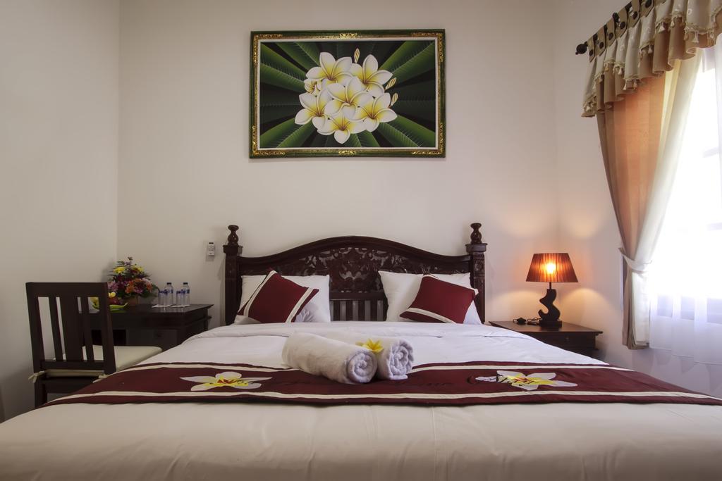 Frangipani Homestay Nusa Dua (Bali) Quarto foto